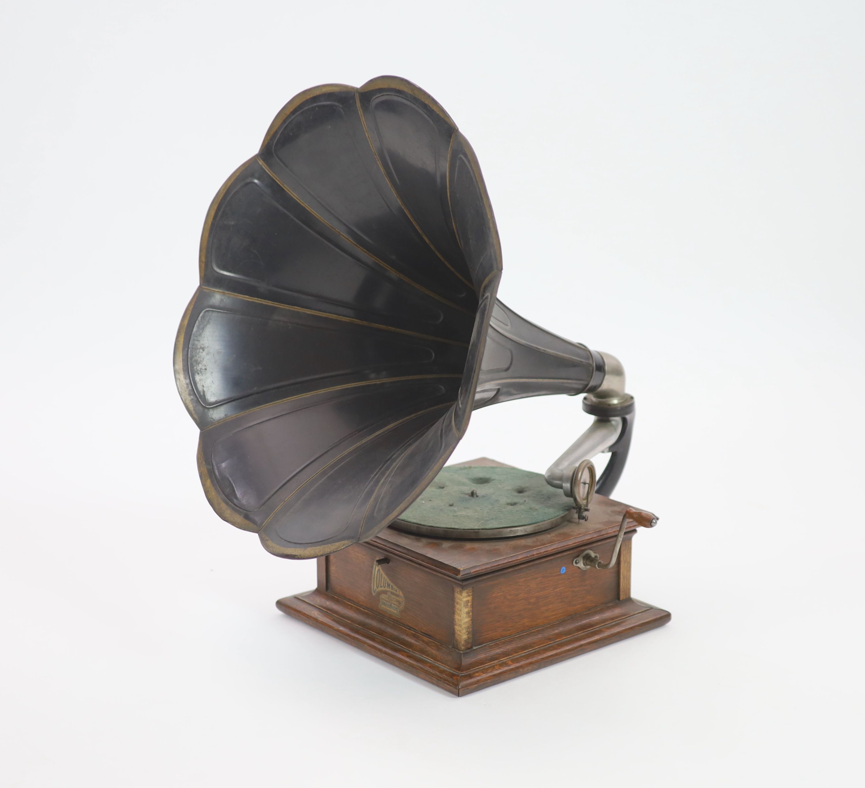 An Edwardian oak cased Columbia gramophone 70cm high.